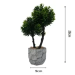 Τεχνητό bonsai δεντράκι με πράσινο φύλλωμα και διπλό κορμό σε ανάγλυφη γλάστρα τύπου πέτρας – διακόσμηση χωρίς φροντίδα για σπίτι ή γραφείο