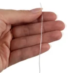 Ελαστική πετονιά Kruzzel 1mm x 40m σε λευκό χρώμα τυλιγμένη σε καρούλα.
