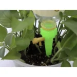 Πράσινο αυτόματο ποτιστήρι φυτών POT WATERING MACHINE σε γλάστρα