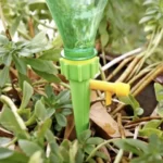 Πράσινο αυτόματο ποτιστήρι φυτών POT WATERING MACHINE σε γλάστρα