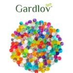 Πολύχρωμες Flower Gel Balls υδρογέλης σε γυάλινο βάζο με φυτό