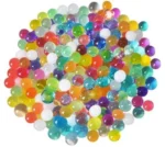 Πολύχρωμες Flower Gel Balls υδρογέλης σε γυάλινο βάζο με φυτό
