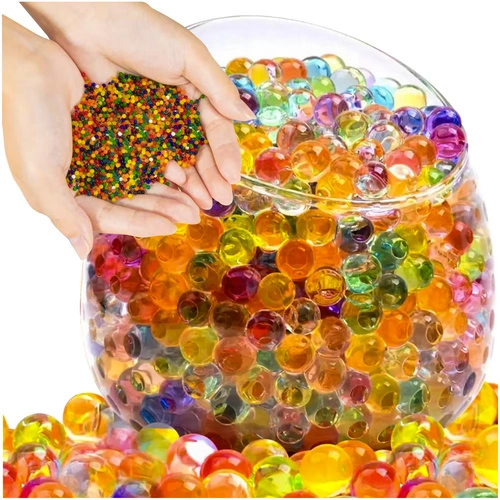 Πολύχρωμες Flower Gel Balls υδρογέλης σε γυάλινο βάζο με φυτό