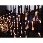 Ηλιακή γιρλάντα κήπου με 100 LED σε σχήμα παγοκρυστάλλων και αισθητήρα νύχτας